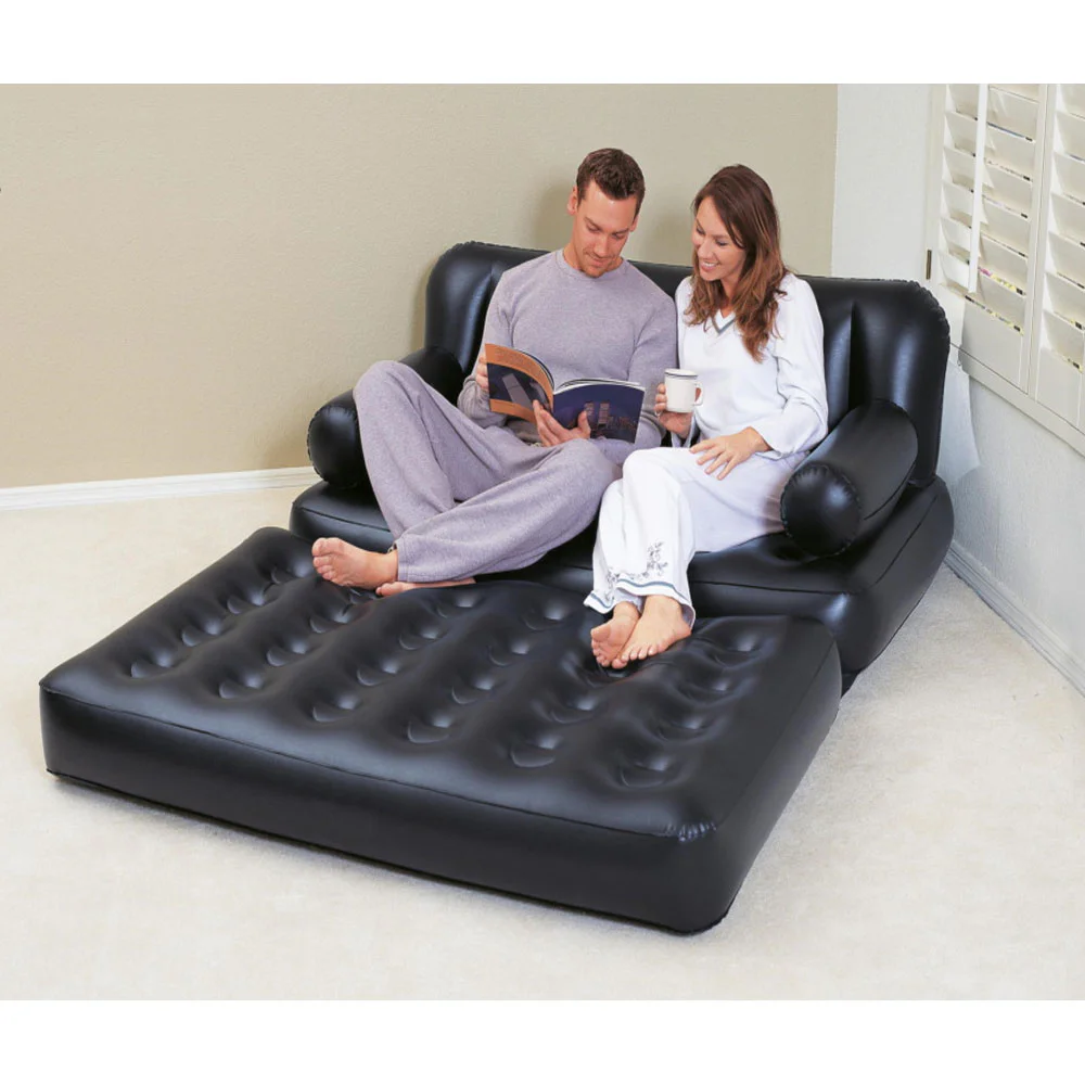 Black inflatable 5-in-1 sofa bed with cushioned backrest, armrests, and a detachable ottoman that converts into a lounger or guest bed. Versatile air sofa for indoor lounging, camping, guest rooms, and temporary sleeping.