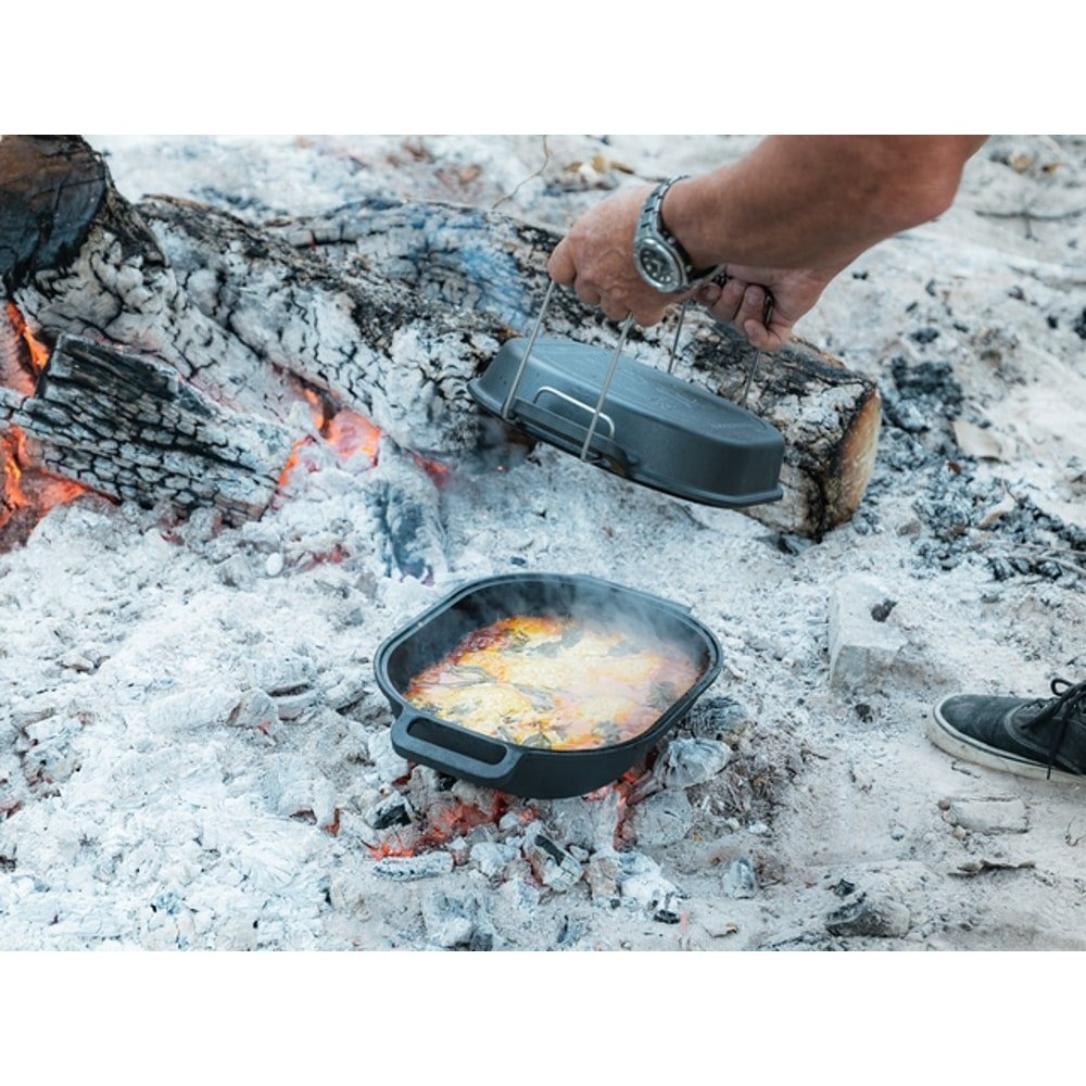 Campfire Combo 4L cast iron camp oven with durable black finish, dual-purpose lid and side handles designed for camping, outdoor cooking and campfire baking adventures