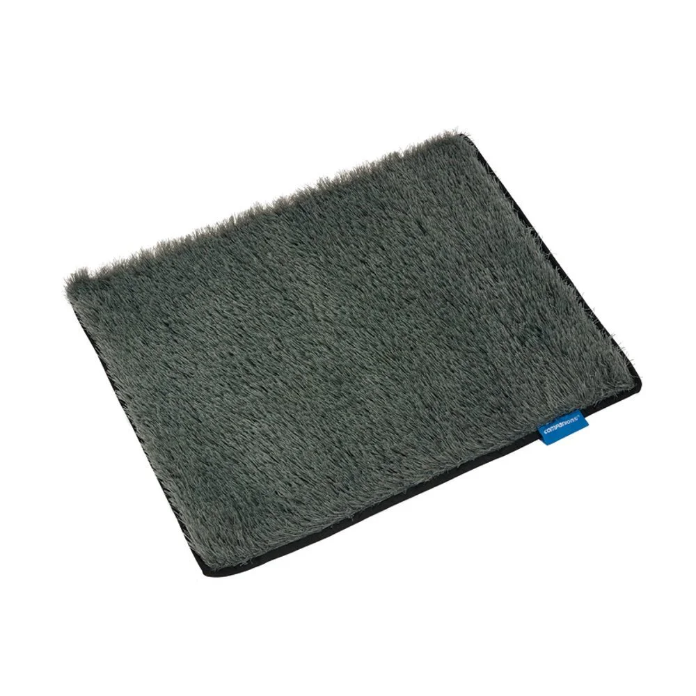 Medium-sized Companion Dust-Off mat measuring 65 x 50cm, featuring a soft grey microfiber surface designed to trap dirt and debris from shoes and camping gear.