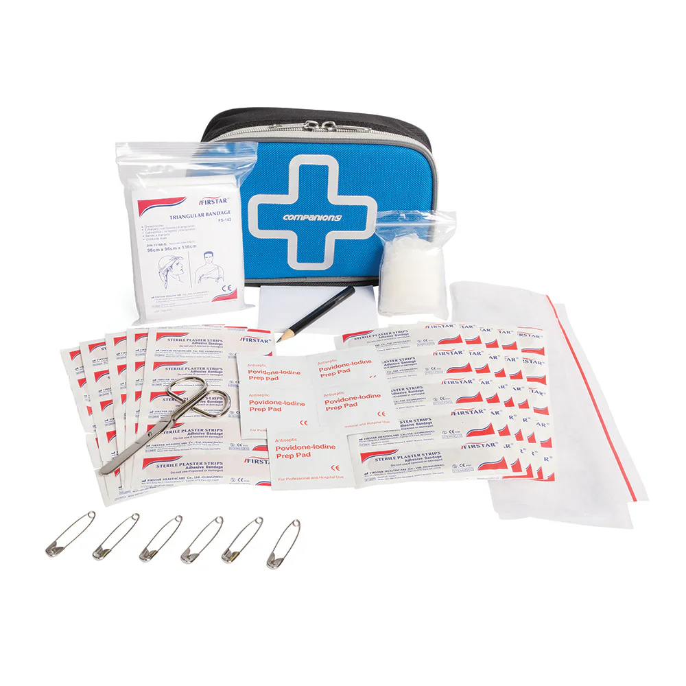 Compact 71-piece personal first aid kit with bandages, dressings, adhesive strips, safety pins, and essential medical supplies stored in a portable zippered case.