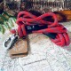 Orange Fell Dog Ridge rope lead with reflective detailing, knotted handle and silver metal trigger clip for secure dog walking.