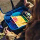 Gregory Alpaca Gear Pod 10L in tan with black mesh lid, carry handle and dual zip opening for organised storage of outdoor gear, travel items and accessories.