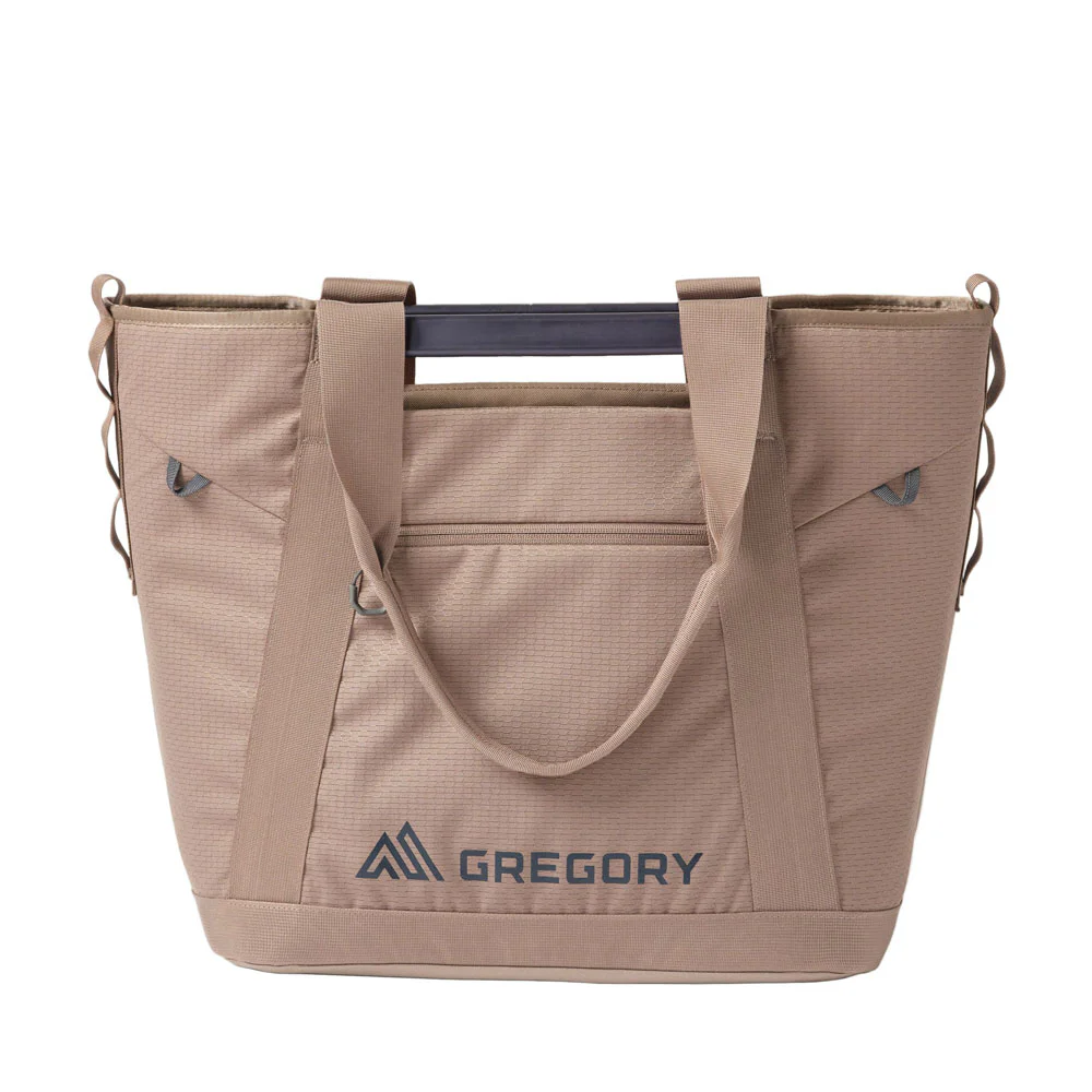 Gregory Alpaca Utility Tote 35L in tan with reinforced carry handles, structured open top and large main compartment for outdoor gear, travel and everyday storage.