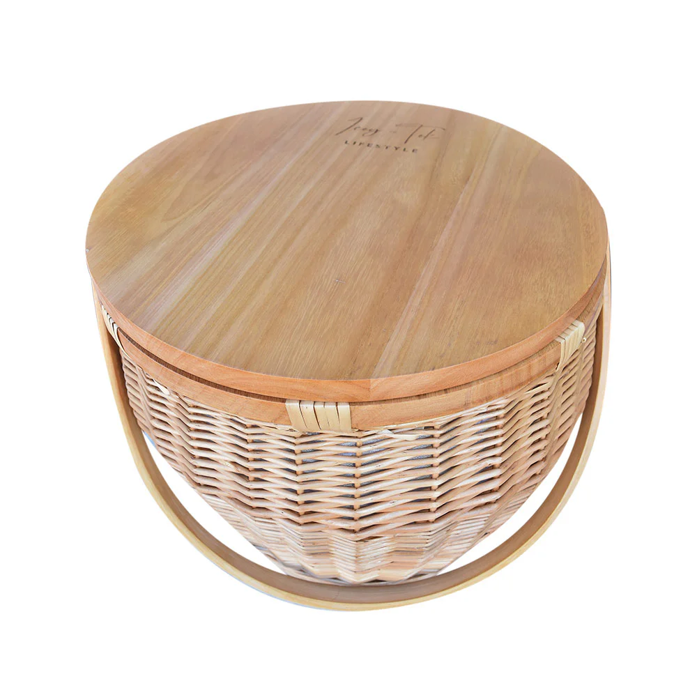 Icey-Tek insulated wicker picnic basket with a round wooden cheese board lid and curved carry handle, shown on a white background.
