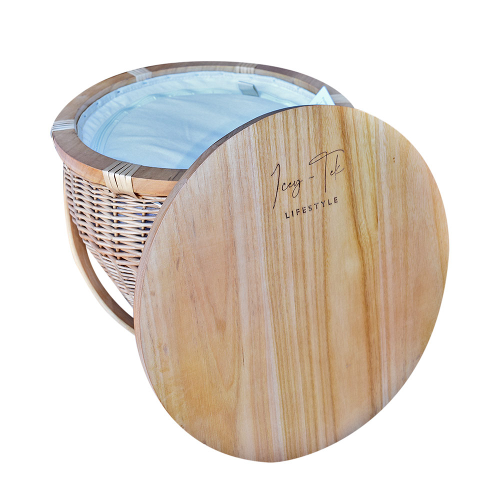 Icey-Tek insulated wicker picnic basket with a round wooden cheese board lid and curved carry handle, shown on a white background.