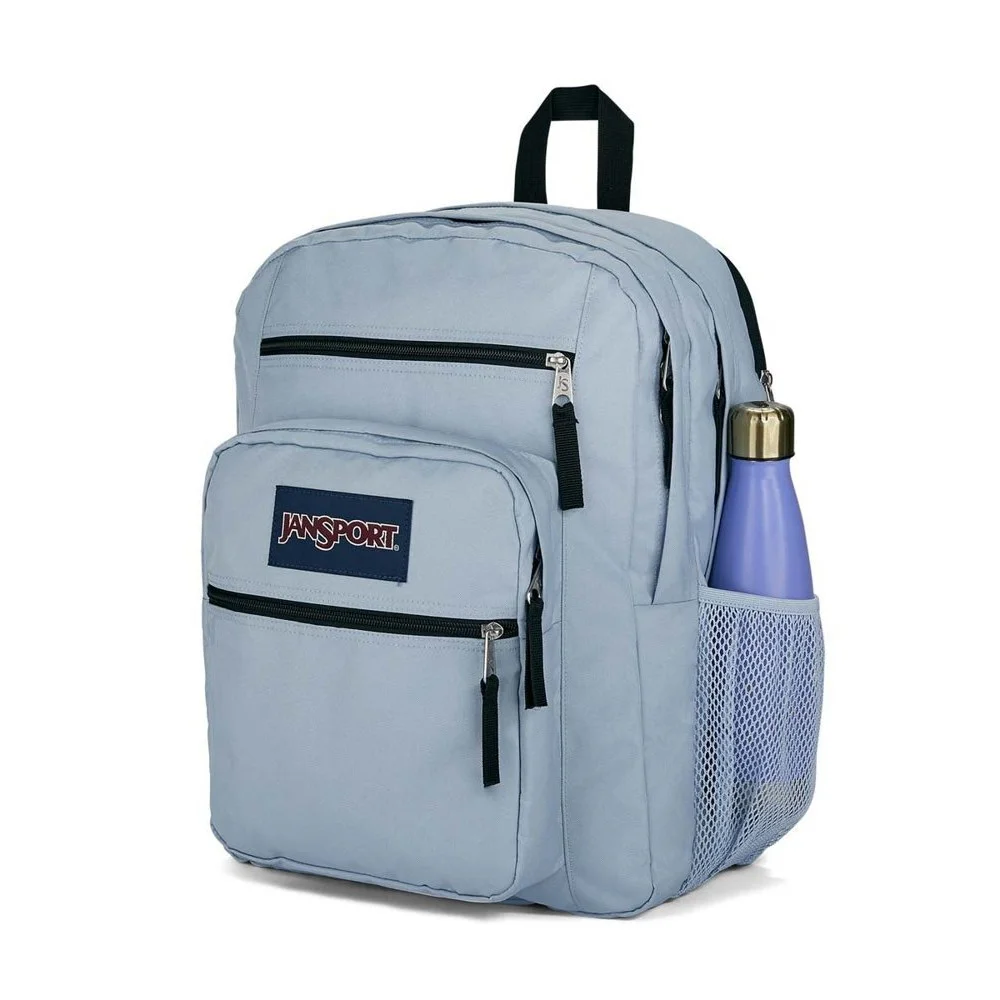 JanSport Big Student 34L backpack available in multiple colours and patterns, featuring two large main compartments, dual front zip pockets, side mesh bottle pocket, and padded shoulder straps for school, college, travel, and everyday use.