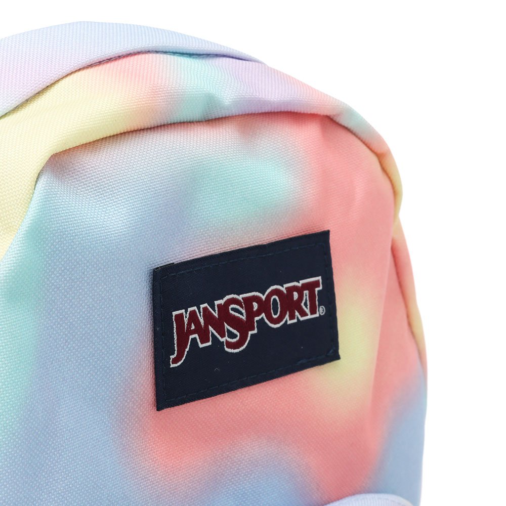 JanSport Half Pint Backpack Mood Map – 10L JanSport Half Pint 10L mini backpack in Mood Map pastel tie-dye with a front zip pocket, top carry handle, and compact design for everyday use and travel.