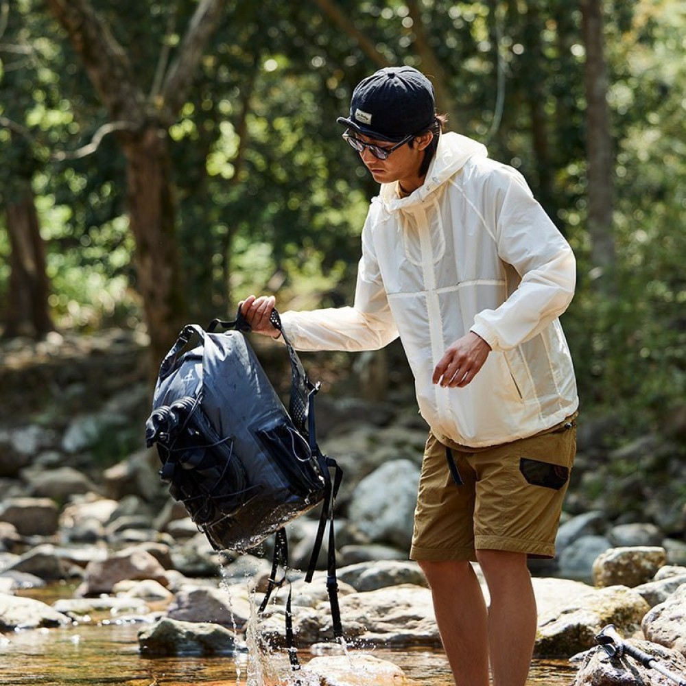 Naturehike Ultralight Waterproof Camping Backpack – 25L Naturehike 25L ultralight waterproof camping backpack with roll-top closure, front bungee cords and side mesh pockets, shown in multiple colours.