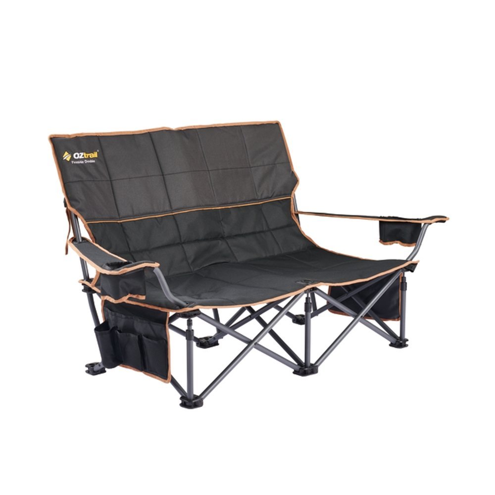 OZtrail Fireside Double Folding Camping Chair Black OZtrail Fireside double folding camping chair in black with padded dual seating, cup holders and sturdy foldable frame designed for camping, outdoor events and relaxing by the fire pit