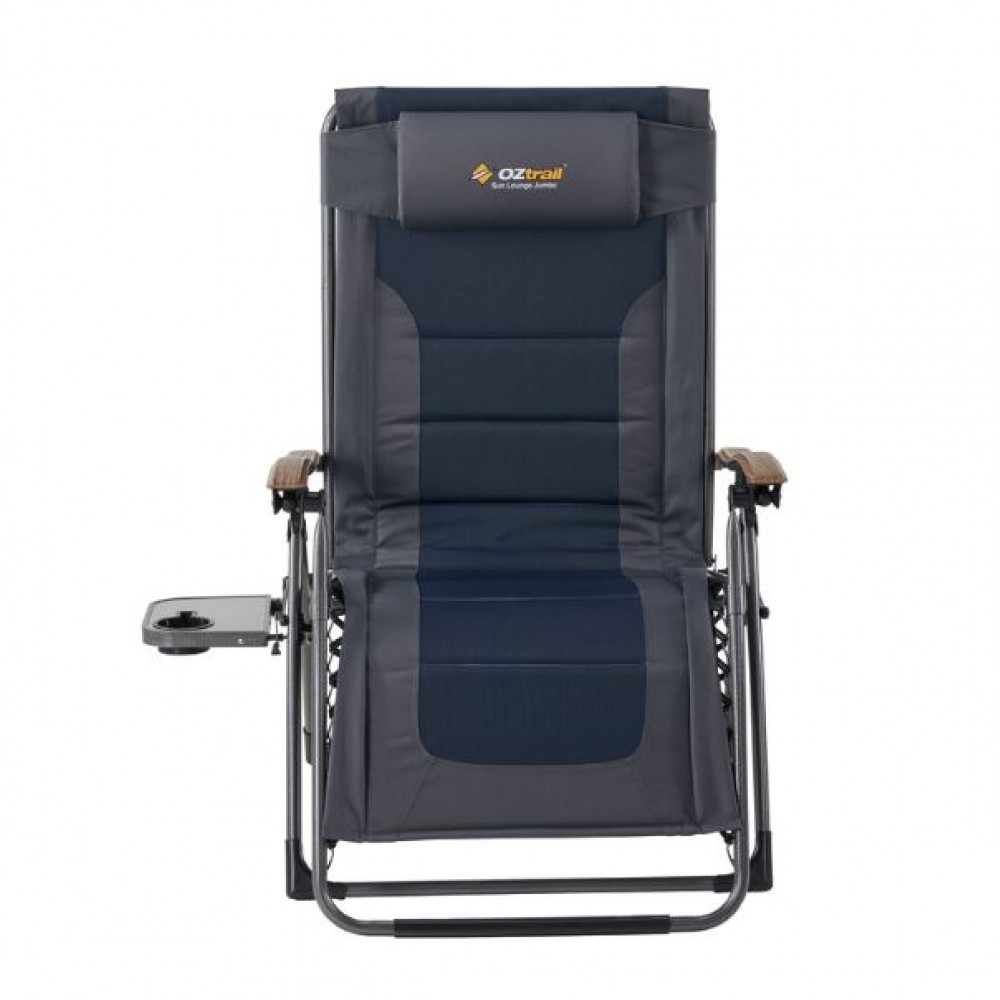 OZtrail Sun Lounge Jumbo recliner camping chair with padded navy seat, adjustable reclining backrest and integrated side table for outdoor relaxation and camping comfort