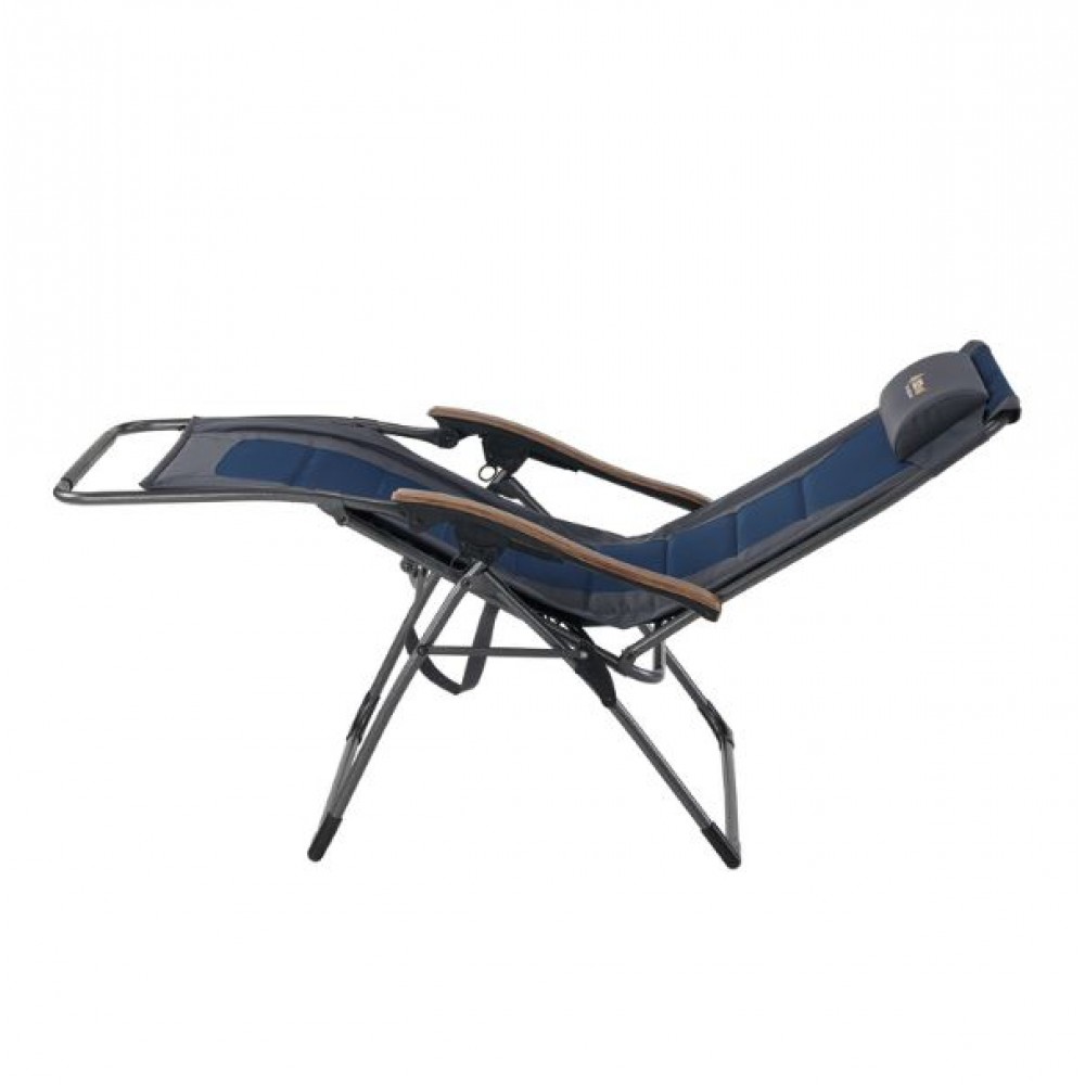 OZtrail Sun Lounge Jumbo recliner camping chair with padded navy seat, adjustable reclining backrest and integrated side table for outdoor relaxation and camping comfort