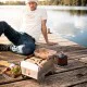 SKOTTI Stainless Steel Grill – Portable Gas BBQ SKOTTI portable stainless steel gas grill with compact flat-pack design, removable cooking grate and gas hose connection, ideal for camping, picnics, caravanning and outdoor cooking.