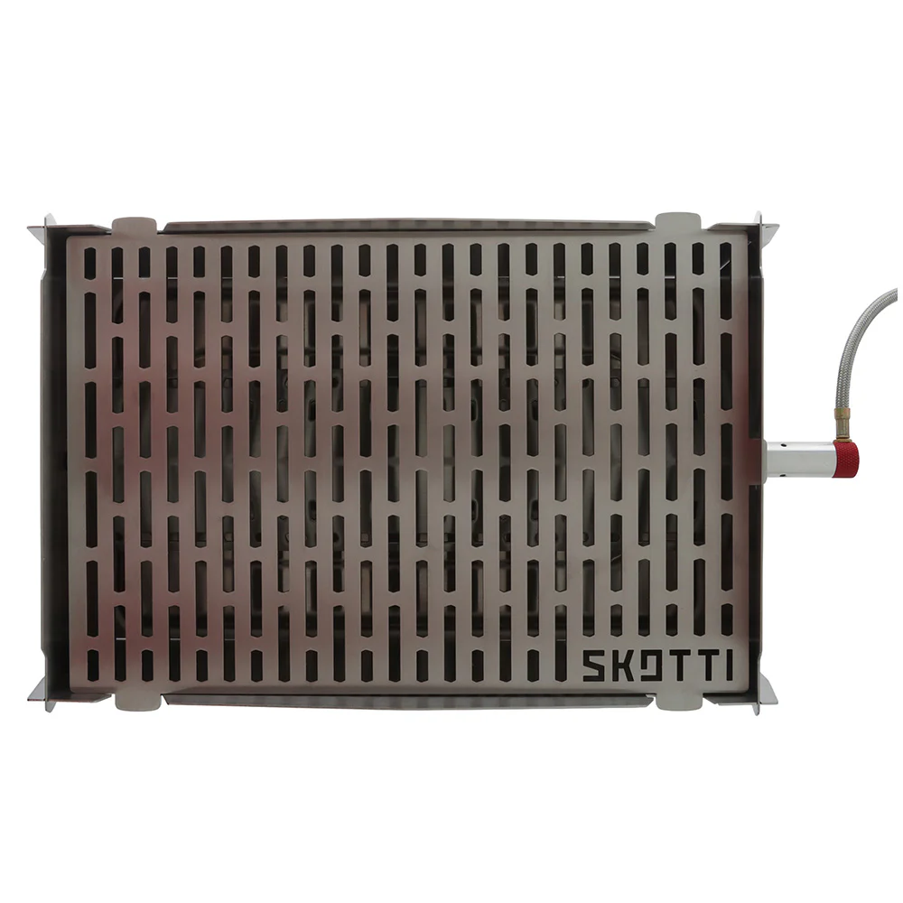 SKOTTI Stainless Steel Grill – Portable Gas BBQ SKOTTI portable stainless steel gas grill with compact flat-pack design, removable cooking grate and gas hose connection, ideal for camping, picnics, caravanning and outdoor cooking.