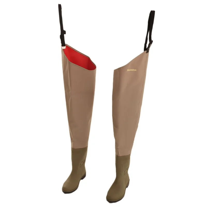 Snowbee thigh waders featuring durable 150D nylon-coated ripstop PVC upper material, integrated waterproof boots, adjustable thigh strap, and lightweight construction designed for fishing, stream wading, and wet outdoor environments.
