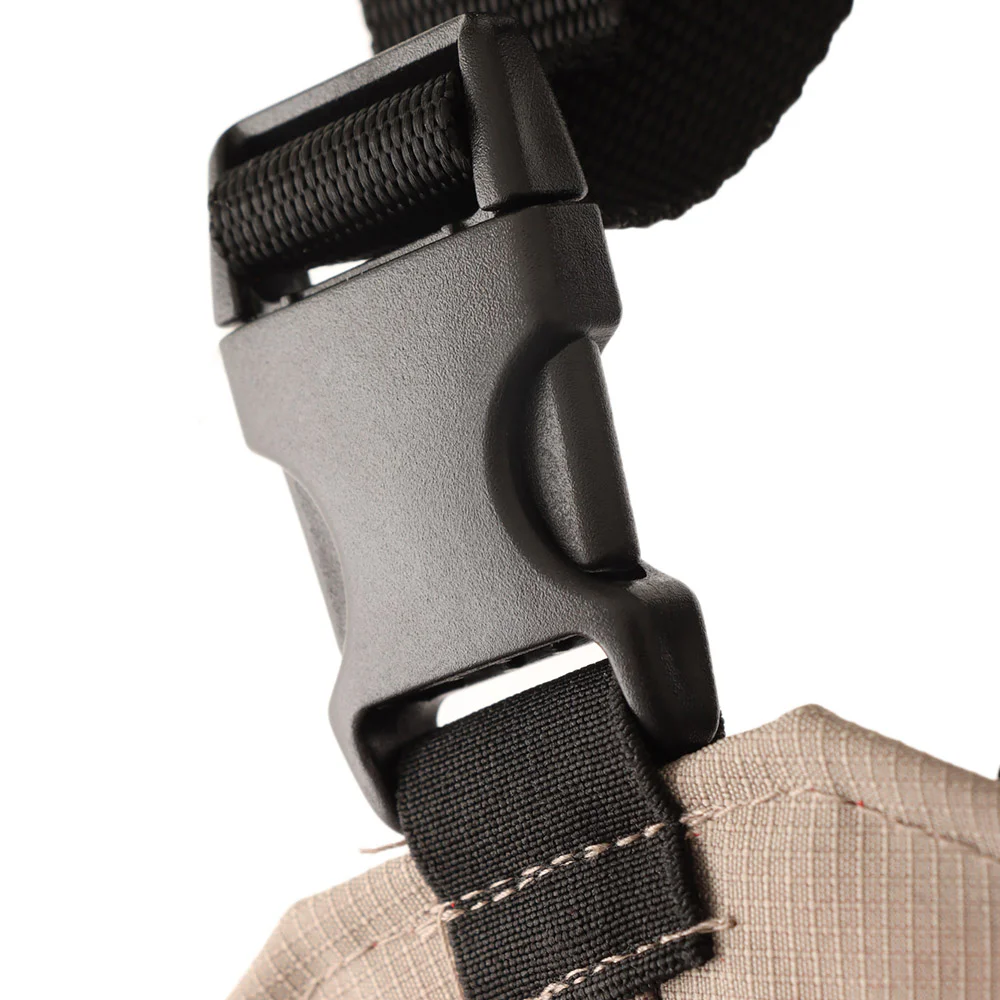 Snowbee thigh waders featuring durable 150D nylon-coated ripstop PVC upper material, integrated waterproof boots, adjustable thigh strap, and lightweight construction designed for fishing, stream wading, and wet outdoor environments.