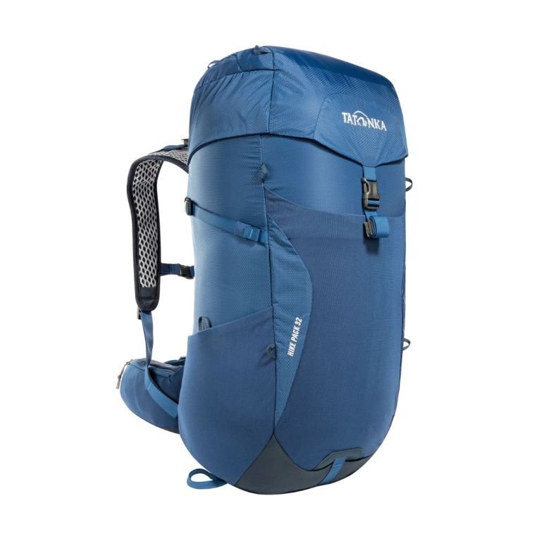 Tatonka Hike Pack 32L tramping backpack in darker blue with padded shoulder straps, ventilated back support, front compression straps and streamlined hiking design.