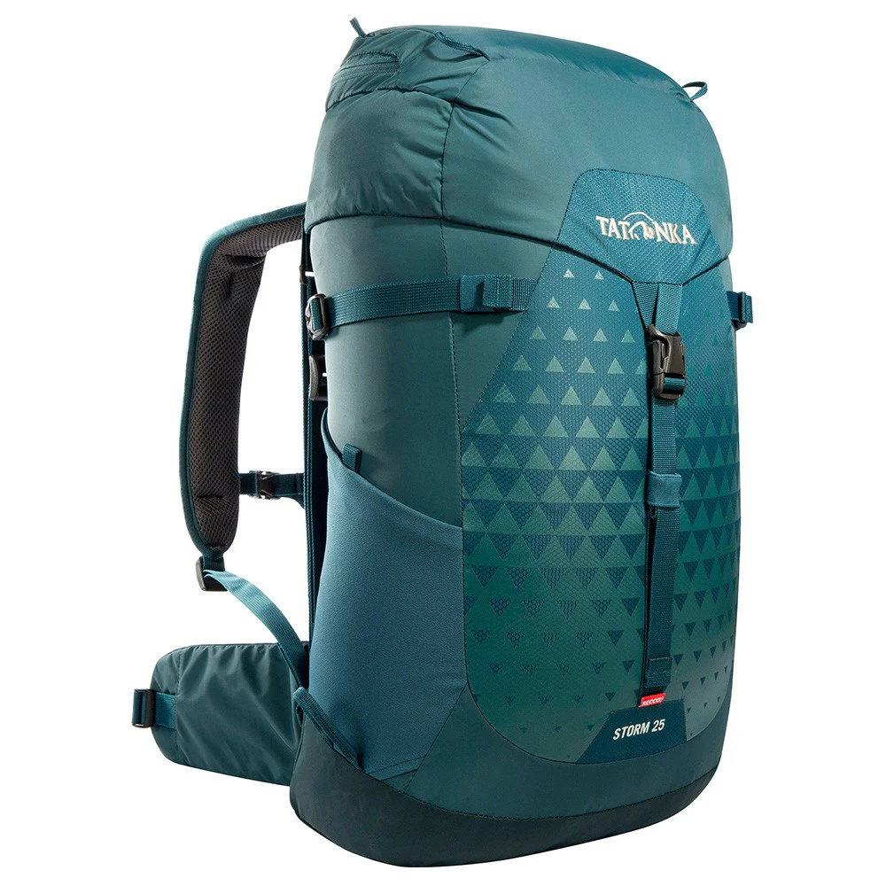 Storm RECCO 25L hiking backpack in teal with a lightweight ergonomic design, padded shoulder straps, adjustable hip belt, side stretch pockets, compression straps, and integrated RECCO reflector for hiking, trekking, and outdoor adventures.