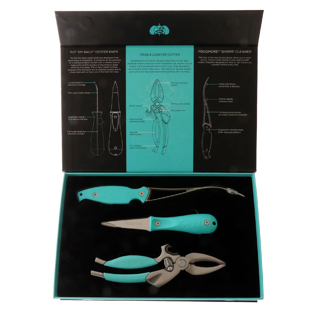 Toadfish Coastal Kitchen Collection – 3 Piece Seafood Tool Set Toadfish Coastal Kitchen Collection featuring three stainless steel seafood tools with aqua handles, including seafood shears, pliers and a precision tool.