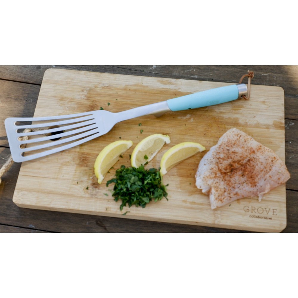 Toadfish Ultimate BBQ Spatula with Spoon Rest Toadfish Ultimate BBQ spatula with slotted stainless steel head, aqua non-slip handle and integrated spoon rest.