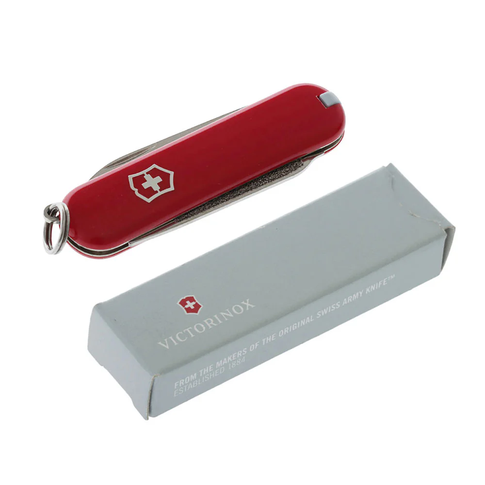 Victorinox Escort Multi-Tool Pocket Knife 58mm Red Victorinox Escort multi-tool pocket knife featuring a compact 58mm red handle and classic Swiss Army Knife design. This lightweight keychain-sized tool includes a small stainless steel blade, nail file with screwdriver tip, key ring, tweezers, and toothpi
