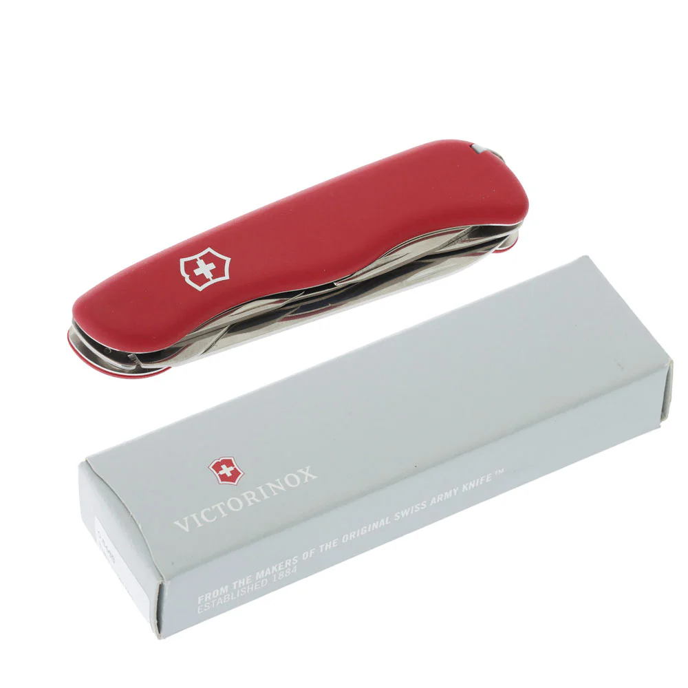 Victorinox Trailmaster Swiss Army Knife featuring a durable 111mm red handle and locking stainless steel blade designed for outdoor and utility tasks. This Swiss-made multi-tool includes a large blade, wood saw, can opener, bottle opener, flathead screwdr