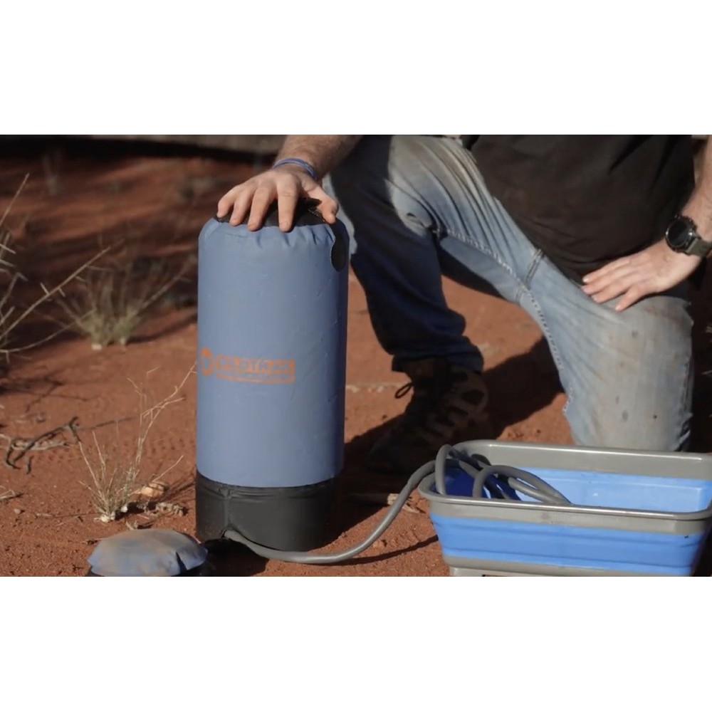 Wildtrak 15L portable camping shower with foot pump, hose, shower head and compact carry bag designed for camping, beach trips, outdoor cleaning and off-grid showering