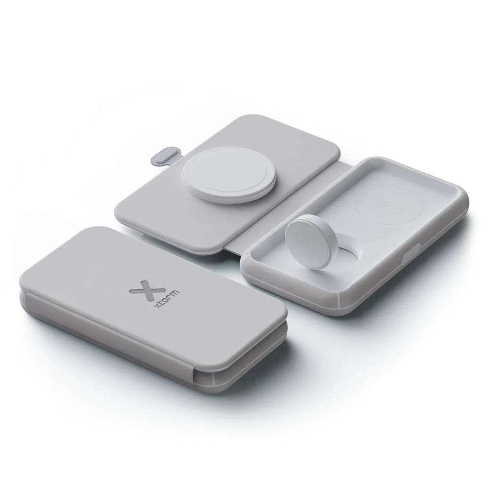 Xtorm foldable 3-in-1 wireless travel charger with compact magnetic design for charging a smartphone, smartwatch and wireless earbuds simultaneously, ideal for travel, office and everyday use.