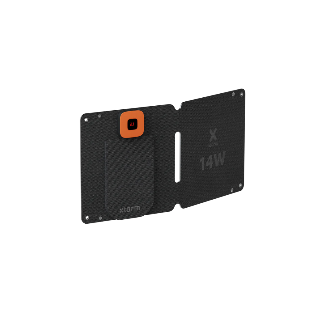 Xtorm SolarBooster 14W portable solar charger with foldable dual-panel design and lightweight construction for charging smartphones, power banks and USB devices during camping, hiking, travel and outdoor adventures.