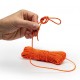 Knotting the Utility TinderCord for Field Use Hand tying knot in SOL TinderCord for emergency setup