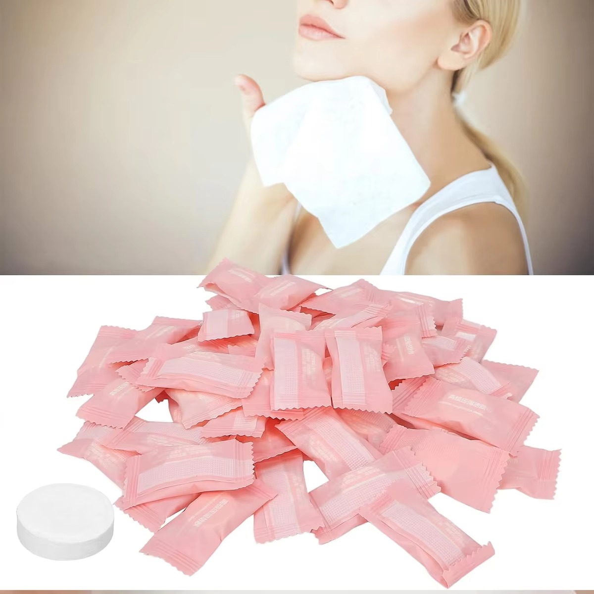 Pile of pink individually wrapped compressed towel tablets with expanded white face towel in use
