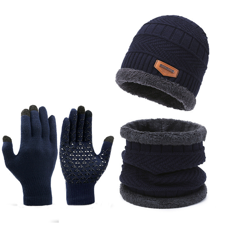 Winter accessory set featuring a fleece-lined navy blue beanie, matching neck warmer, and touchscreen-compatible knit gloves for warmth and comfort in cold weather.