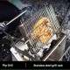 360 degree rotating BBQ grill with flip rack cooking whole chicken over charcoal, stainless steel construction for even heat distribution
