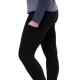 Close-up of side stretch pocket on black women's tights showing practical storage and soft fabric texture