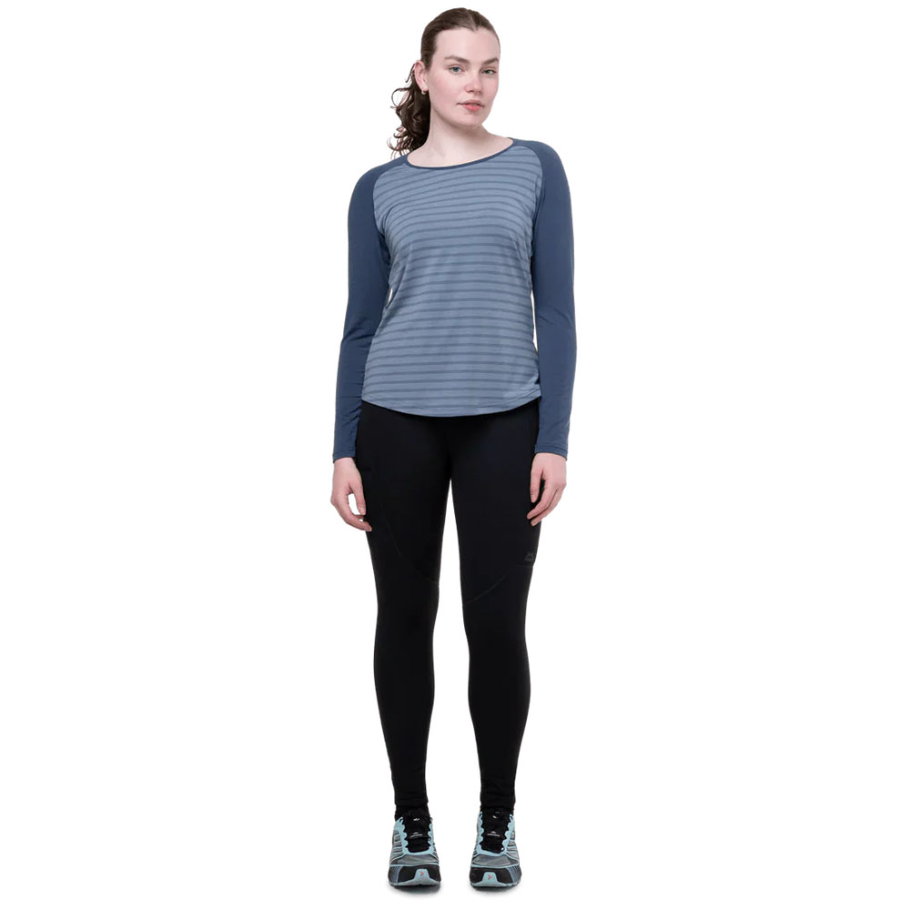 Black full-length women's technical tights with clean front design and streamlined fit for active mountain use