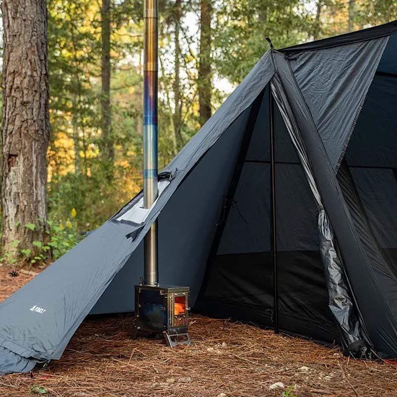Full view of POMOLY STOVEHUT 20 tent with extended awning and stove jack