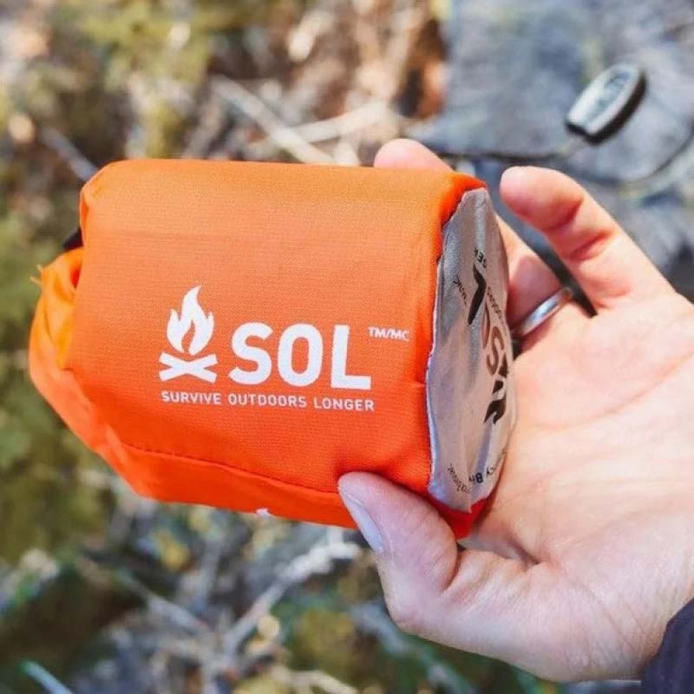 Packed SOL Bivvy in Stuff Sack with Whistle Compact SOL Bivvy Bag in Stuff Sack – Lightweight Shelter NZ