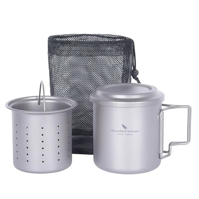 Titanium camping mug set by Boundless Voyage including a lid, tea strainer, and mesh carry bag.