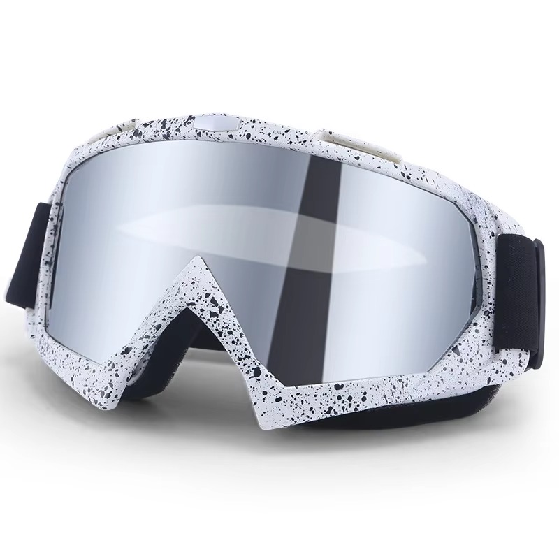 White speckled ski snowboard goggles with silver mirrored anti fog lens and adjustable black elastic strap