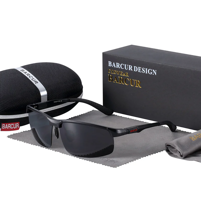 BARCUR polarized driving sunglasses with dark wraparound lenses, protective hard case, cleaning cloth and branded gift box.