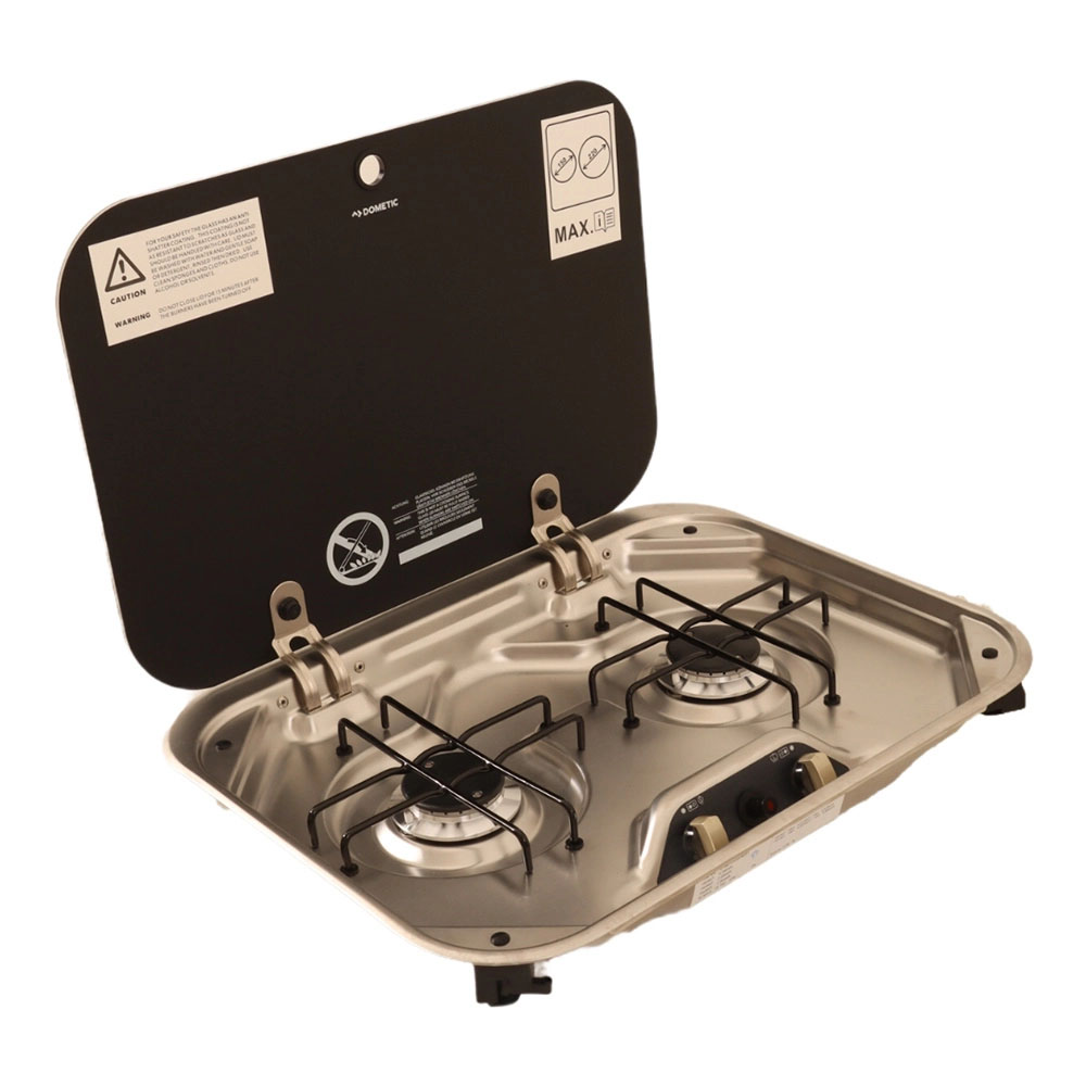 Dometic 2 Burner Gas Stove with Glass Lid Open Dometic 2 burner gas stove with glass lid open showing stainless steel hob for caravan and campervan kitchens