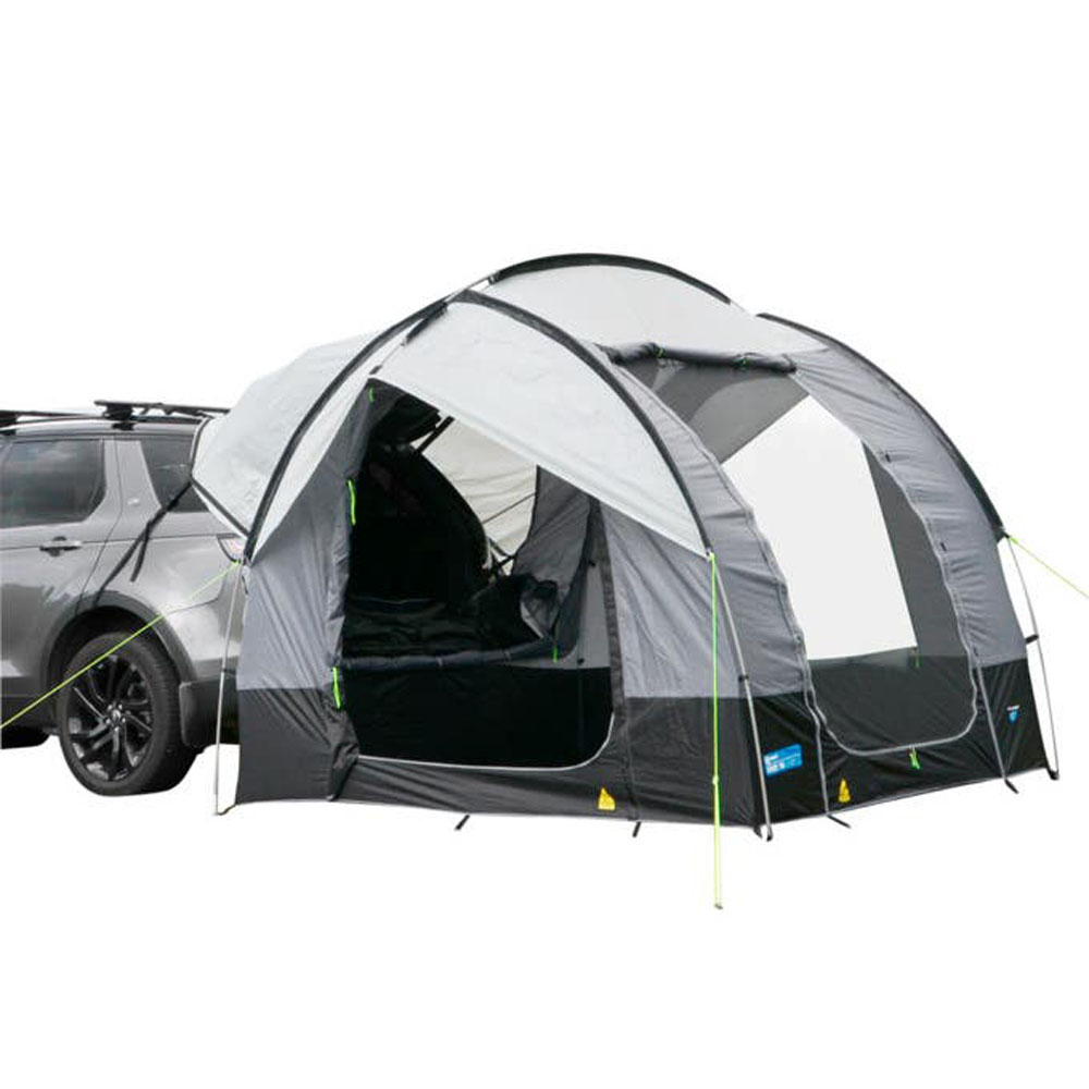 Dometic Tailgater Travel Pod SUV Awning Tent Dometic Tailgater Travel Pod attached to SUV creating sheltered camping space with enclosed awning tent