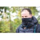 Man wearing black windproof thermal face mask outdoors during hiking and cold weather trekking adventure
