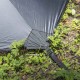 Reinforced Corner of HUSSAR 20 Tent Close-up of Pomoly HUSSAR 20 tent corner showing reinforced stitching and adjustable strap on the ground.