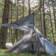 Pomoly HUSSAR 20 Tent with Awning and Stove Setup Pomoly HUSSAR 20 hot tent featuring a canopy setup with lantern hanging and stove pipe fitted through the jack.