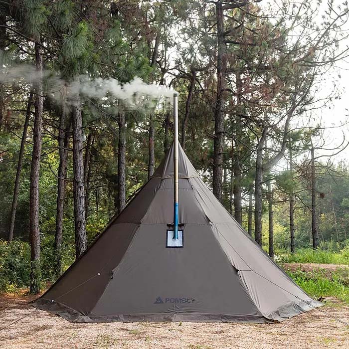 Front view of Pomoly HUSSAR Plus 2.0 Hot Tent pitched in forest with stove