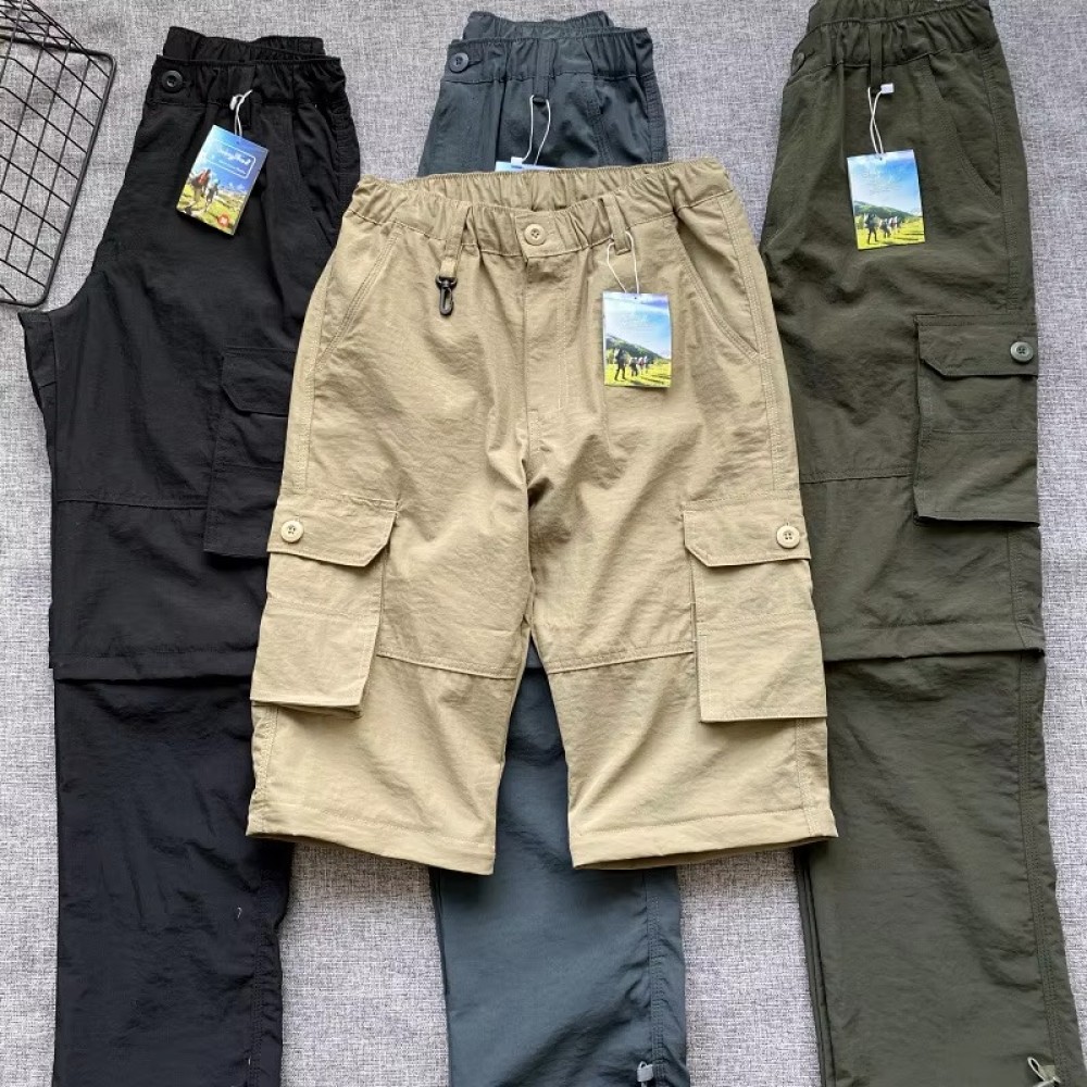 Assorted men’s lightweight outdoor cargo pants in black, khaki, dark green, and grey with water-repellent fabric and elastic waistband