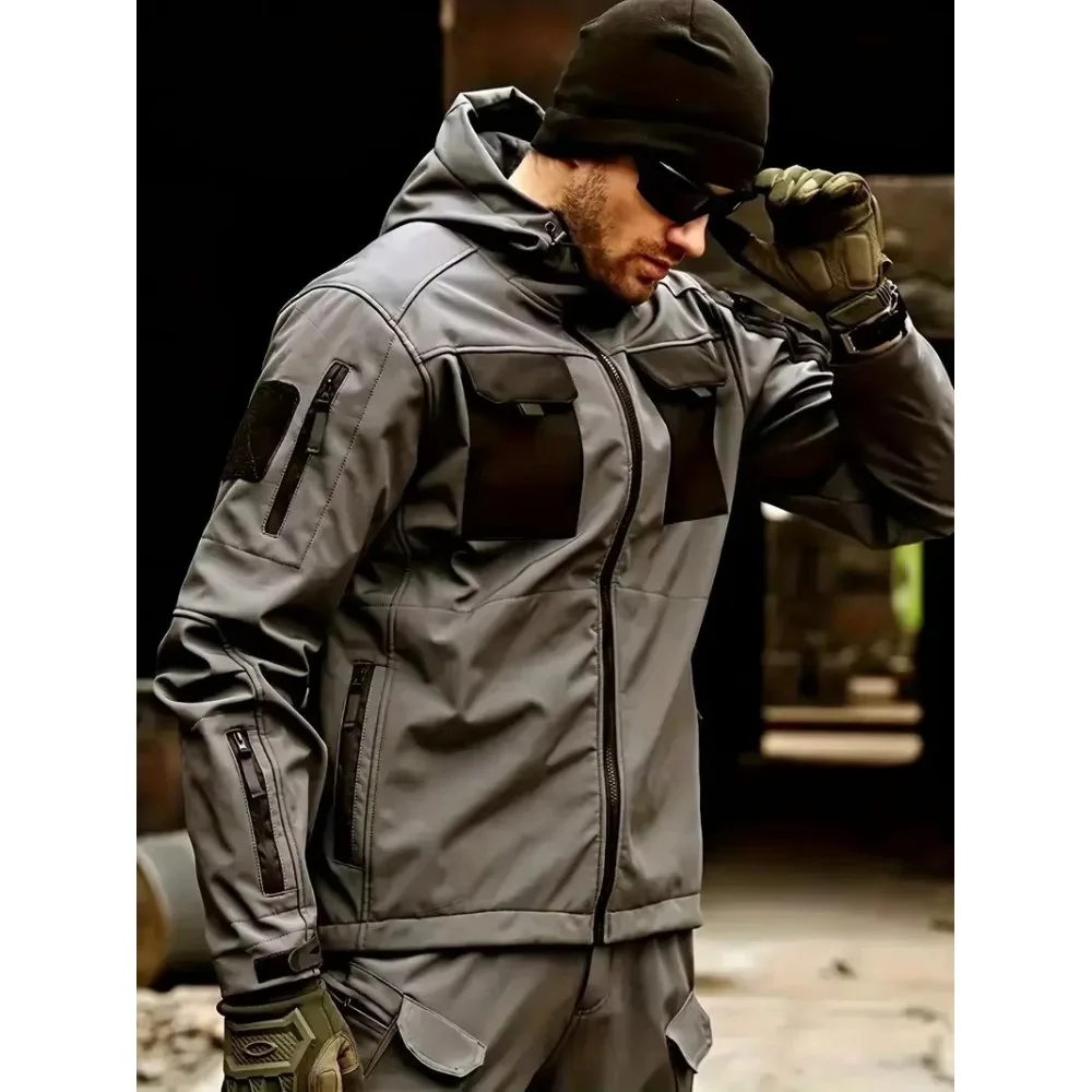 Men's Winter Tactical Softshell Jacket Men's black tactical softshell jacket with a hood, multiple utility pockets, and weather-resistant construction, designed for outdoor, hiking, and winter activities.
