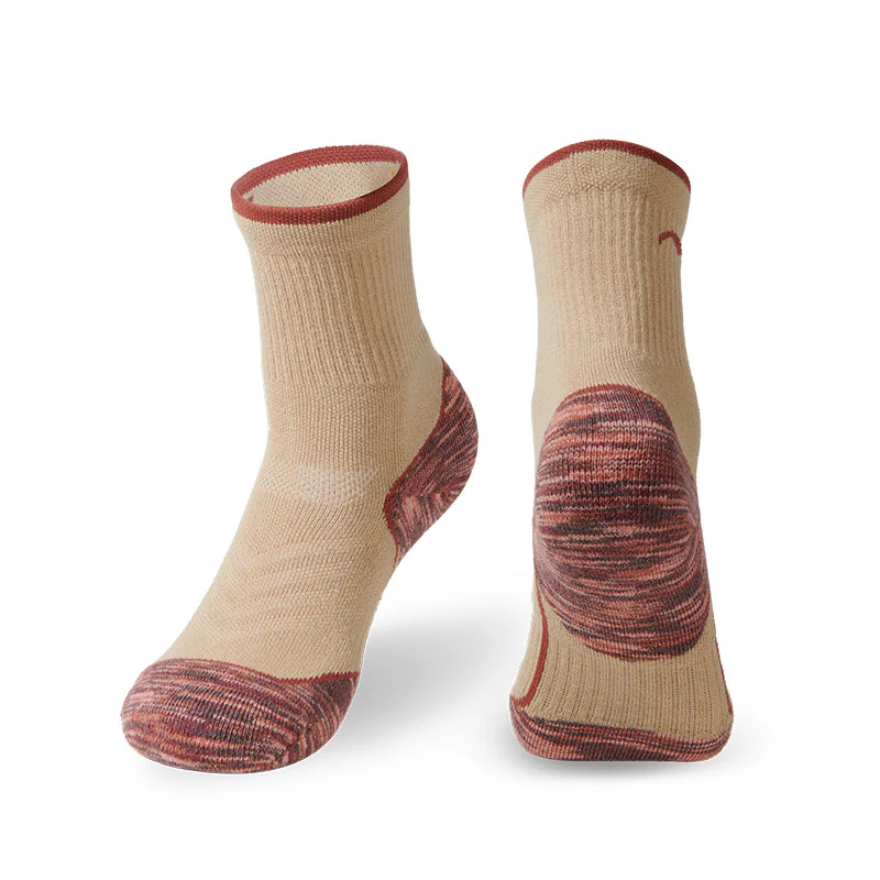 Pair of Naturehike wool blend sports socks in beige with brown reinforced heel and toe, featuring breathable, moisture-wicking fabric for hiking, trekking, camping and outdoor activities.