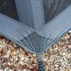 Reinforced Pull Strap Detail – Openvista 2 Tent Close-up view of Openvista 2 corner showing reinforced pull strap and stitching over ground vegetation.