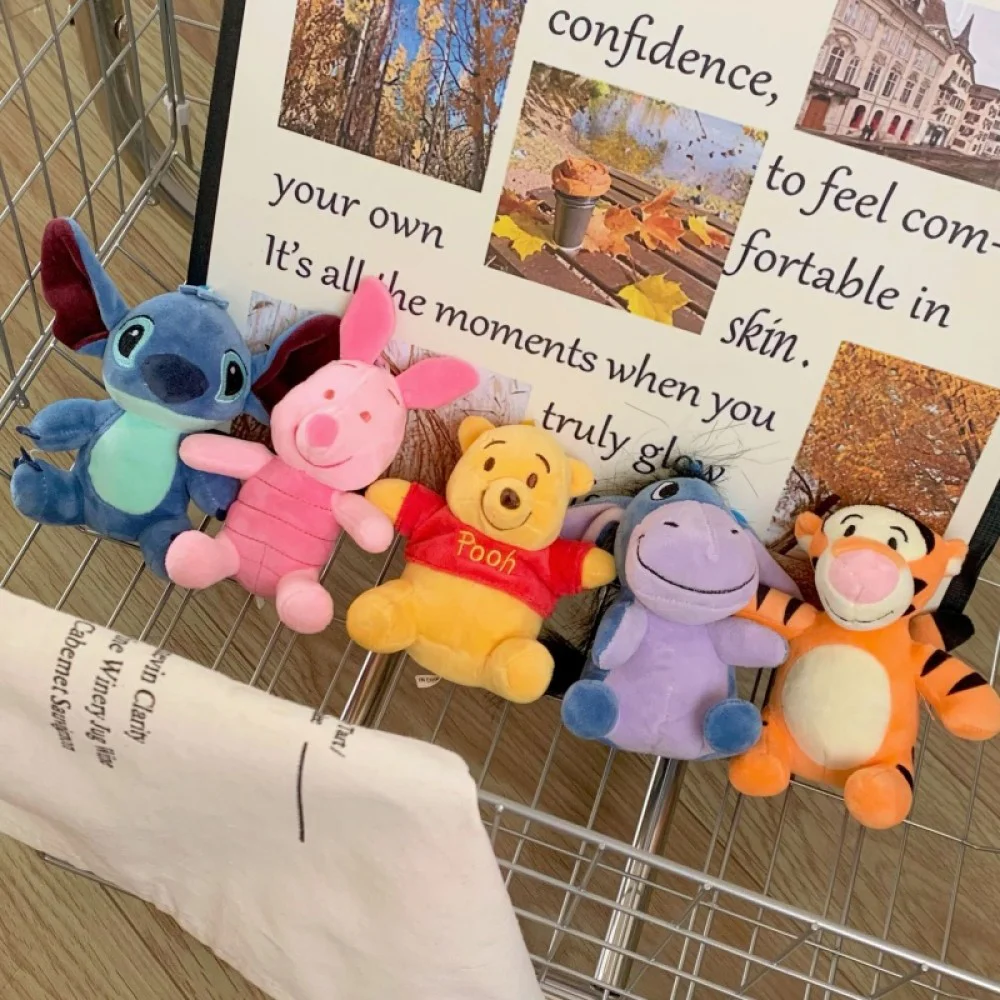 Winnie the Pooh, Tigger, Piglet & Eeyore Plush Toys Set of Winnie the Pooh, Tigger, Piglet and Eeyore soft plush toys displayed together on a white background.
